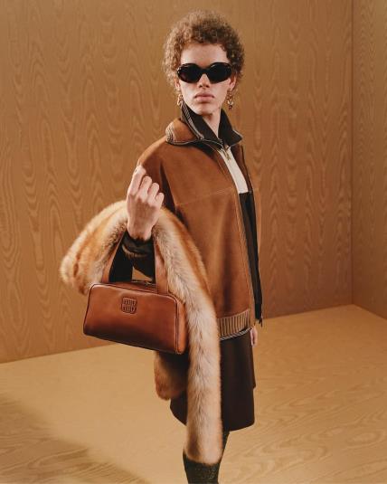 Miu Miu Fall-Winter 2025 collection presents a wardrobe where archetypes are reiterated with a f.jpg